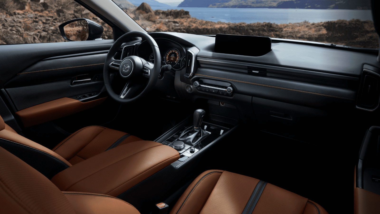 Interior dashboard and brown seats of the 2023 Mazda CX-50