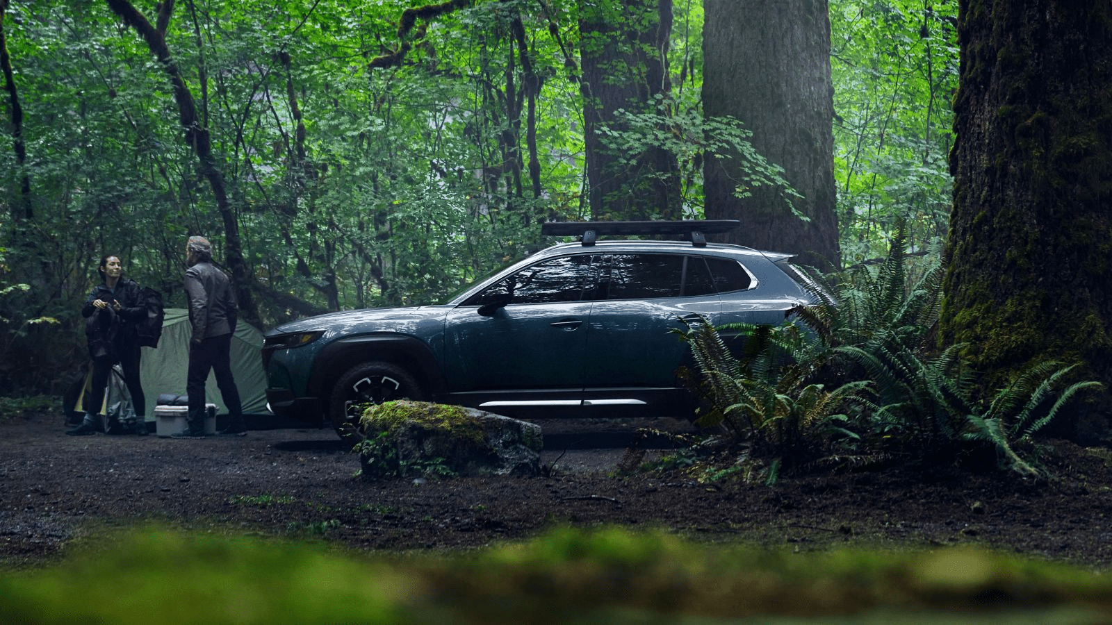 2023 Mazda CX-50 parked near a campsite